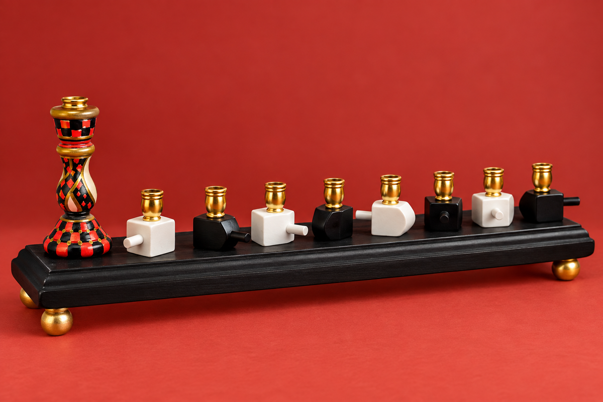 The Roxie Menorah

Hand-Painted Dreidel Menorah in Red, Black & Gold