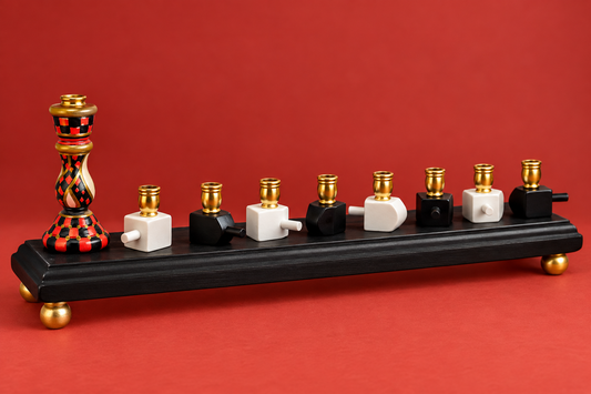 The Roxie Menorah

Hand-Painted Dreidel Menorah in Red, Black & Gold