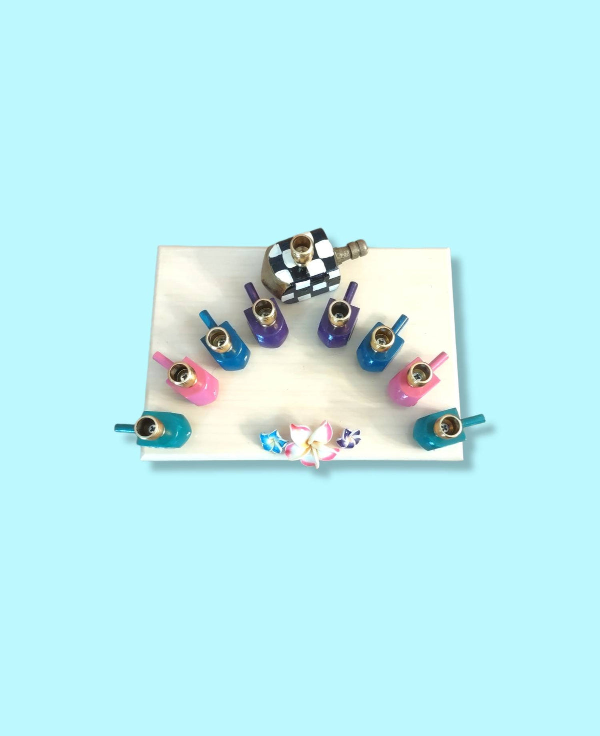 The Abigail Menorah

Hand-Painted Colorful Dreidel & Floral Menorah