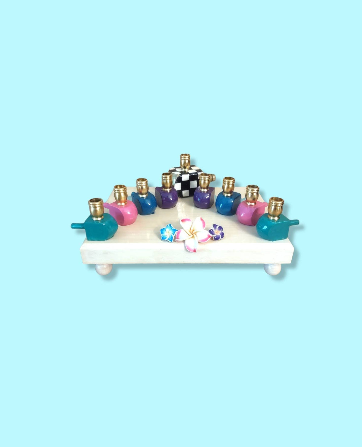 The Abigail Menorah

Hand-Painted Colorful Dreidel & Floral Menorah
