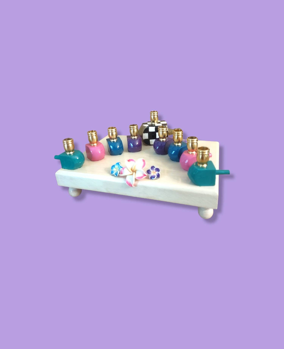 The Abigail Menorah

Hand-Painted Colorful Dreidel & Floral Menorah